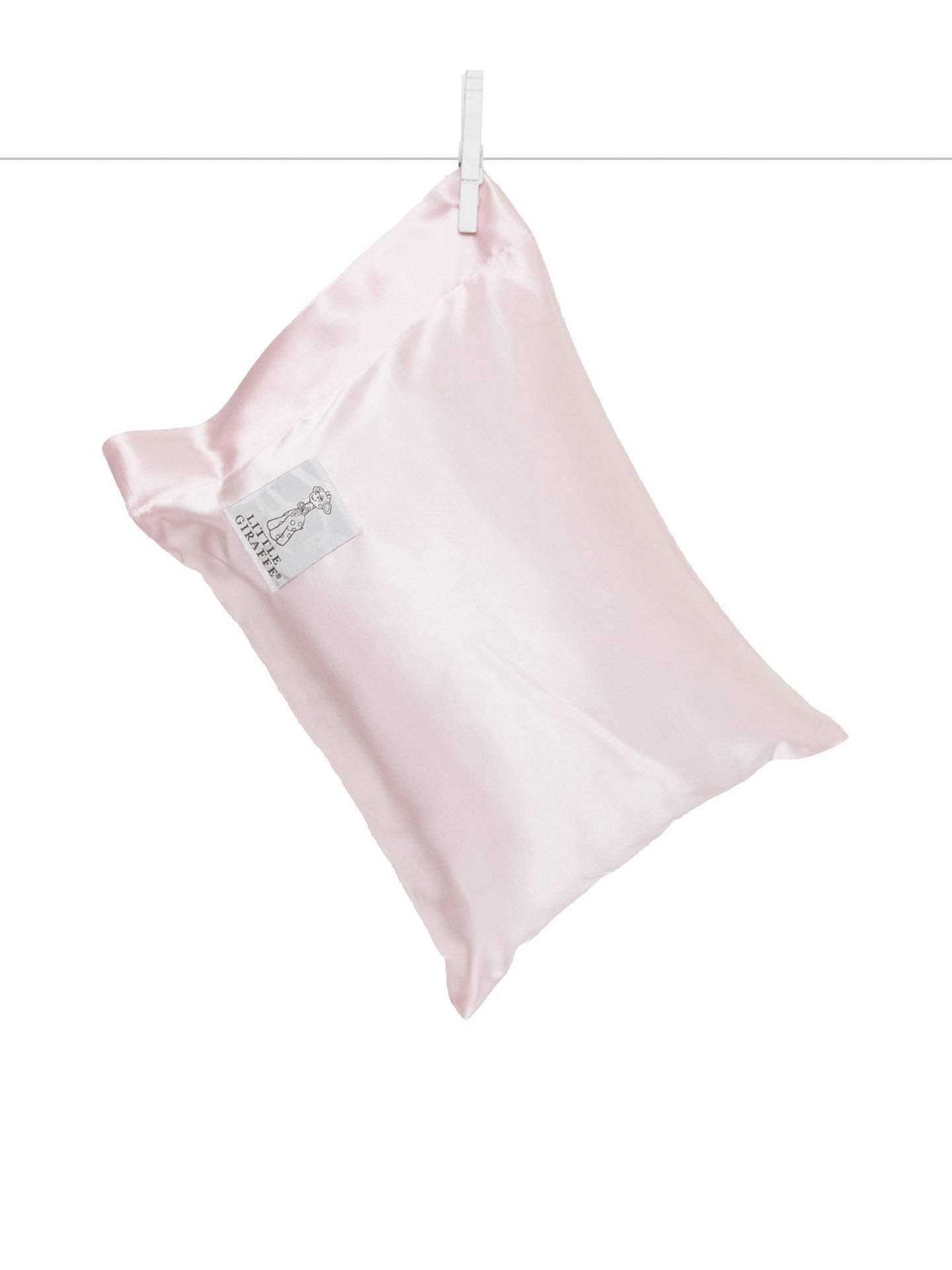 Little Giraffe Satin Decor Pillow closeup reveals feather yarn knit for ultra-soft comfort.