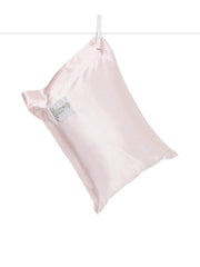 Little Giraffe Satin Decor Pillow closeup reveals feather yarn knit for ultra-soft comfort.