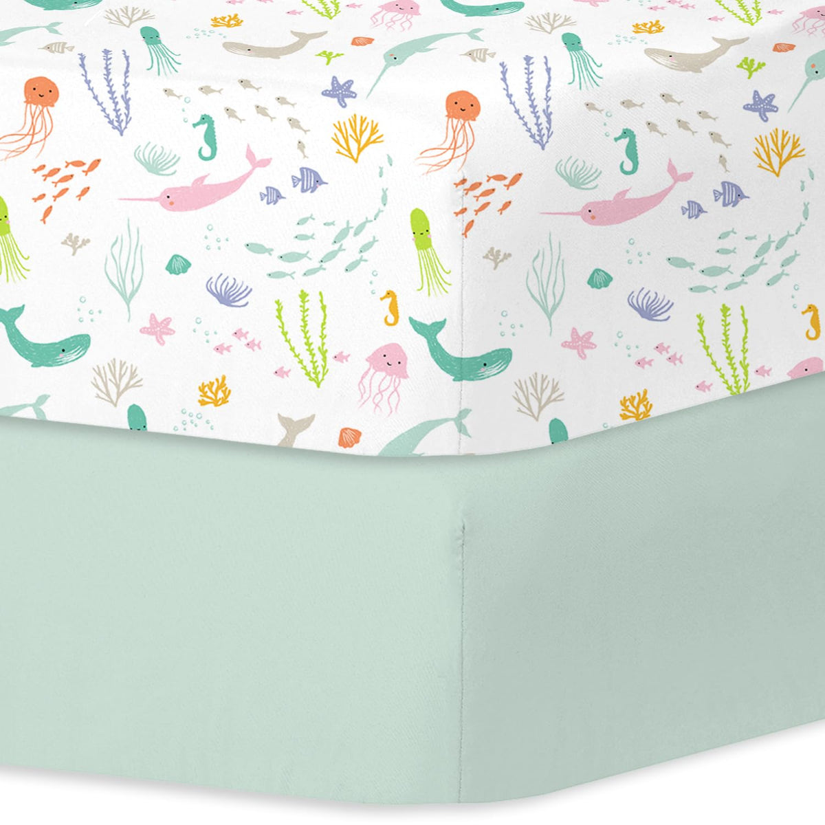 Little Grape Land pastel ocean crib sheet on mattress, soft microfiber for sensitive baby skin.