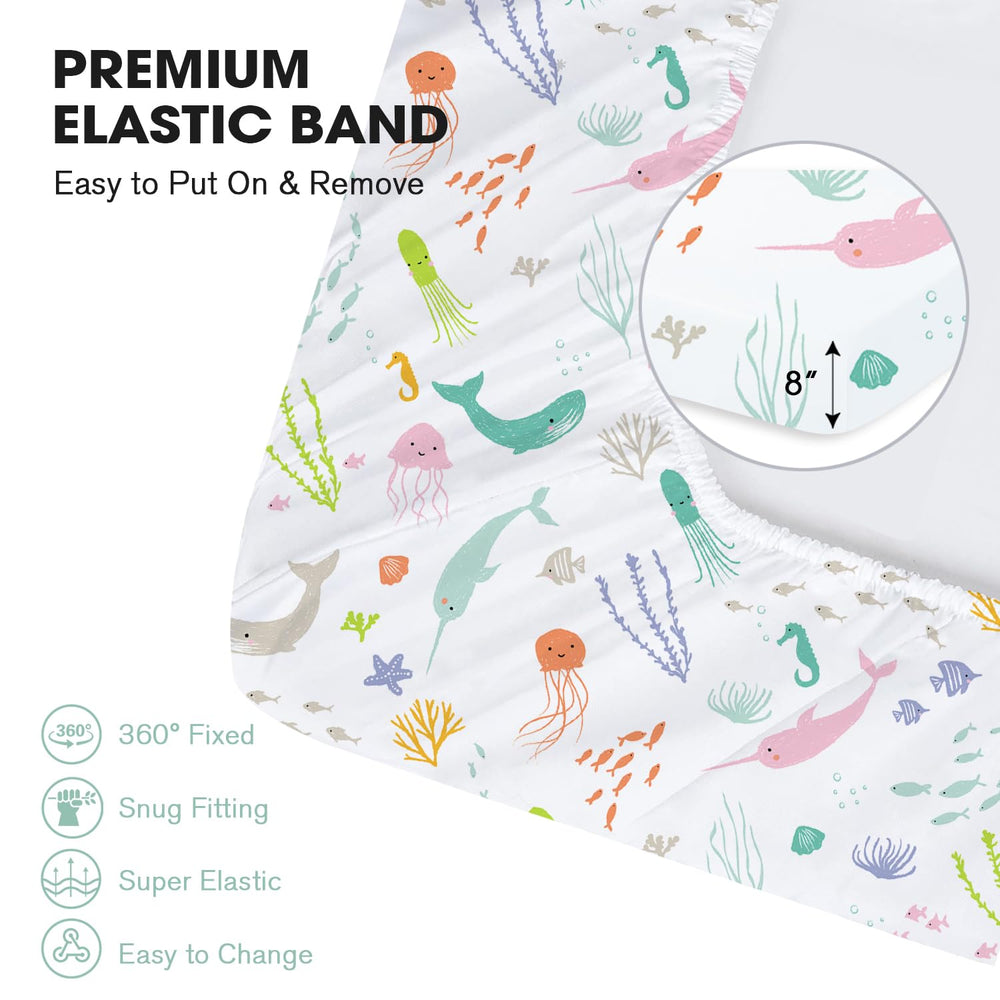 Little Grape Land pastel ocean crib sheet in laundry, machine washable and color-retaining.