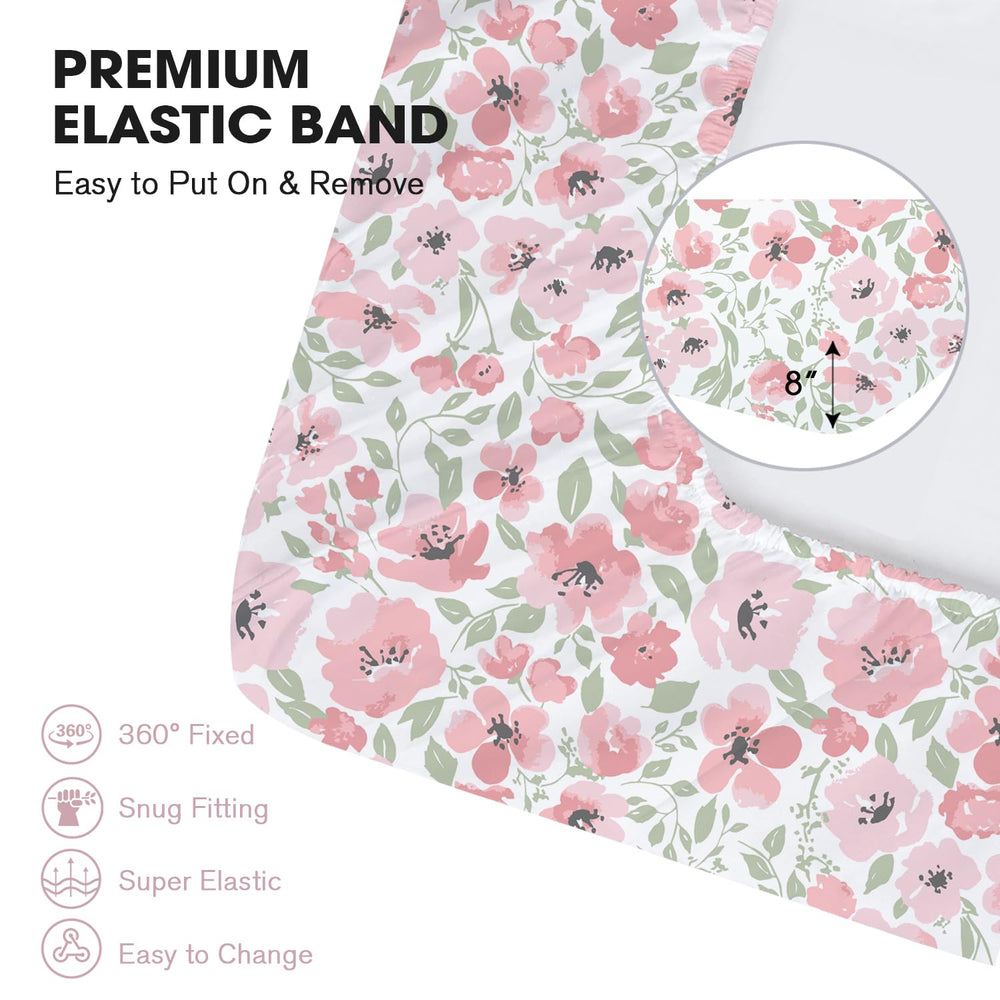 Little Grape Land Daliah printed and solid matching sheets create versatile nursery styling.