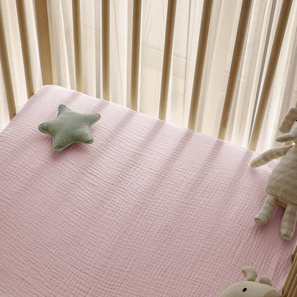 Little Grape Land easy-care crib sheets — machine washable for simple routine cleaning
