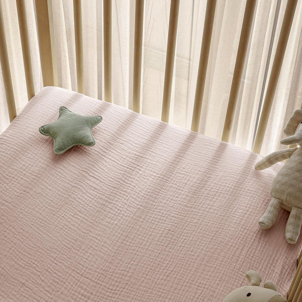 Little Grape Land muslin crib sheets close-up texture shows breathable cotton
