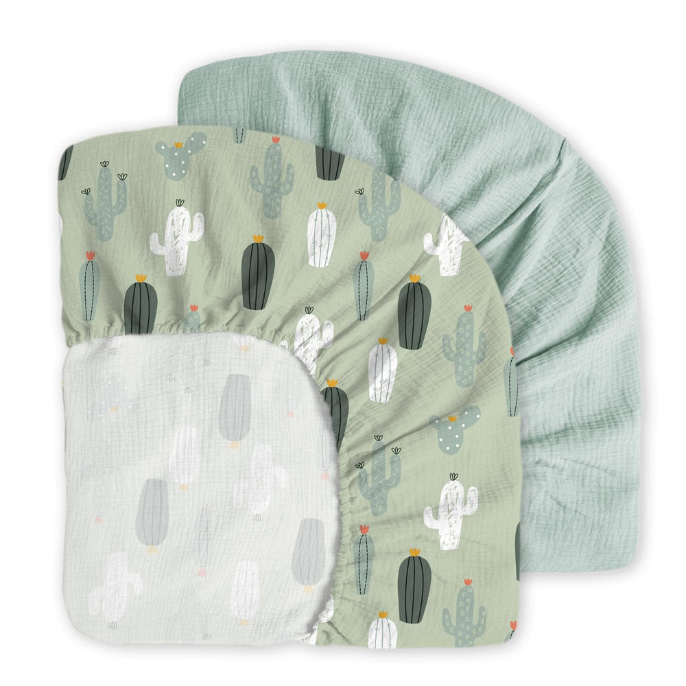 Little Grape Land muslin sheets texture close-up shows ultra-soft cotton for baby's skin.