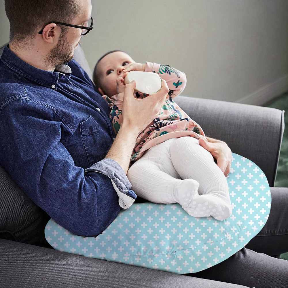 Little Grape Land nursing pillow with machine-washable cover for easy cleanup.