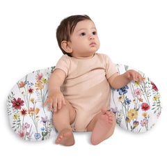 Little Grape Land nursing pillow with spring flower cover provides firm loft for comfortable feeding.