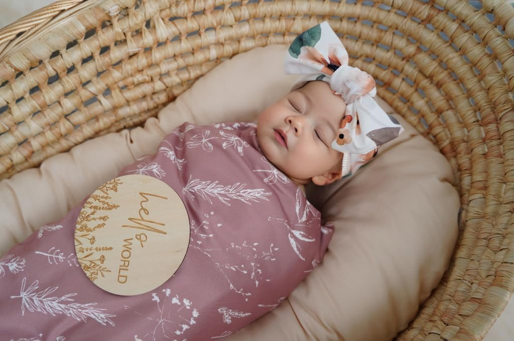 Little Jump swaddle blanket in stroller—perfect travel companion.