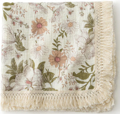 Little Jump cotton muslin swaddle with tassel fringe for breathable newborn comfort.
