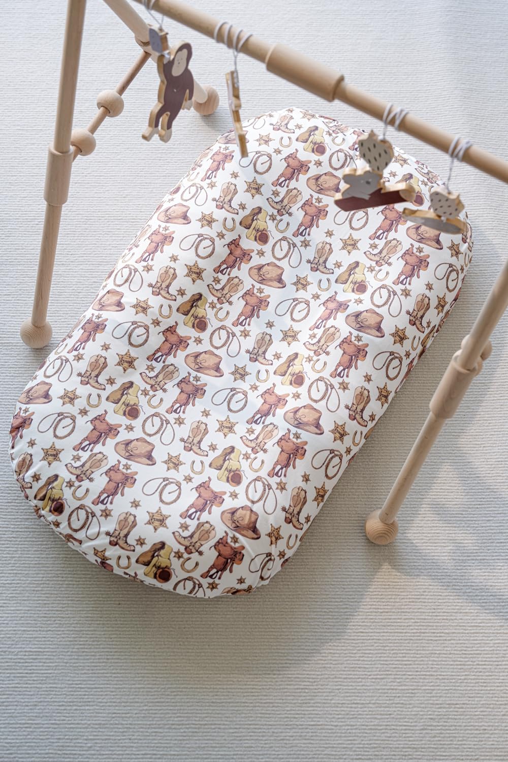 Little Jump horse-rope-design cover brightens the nursery while protecting the lounger