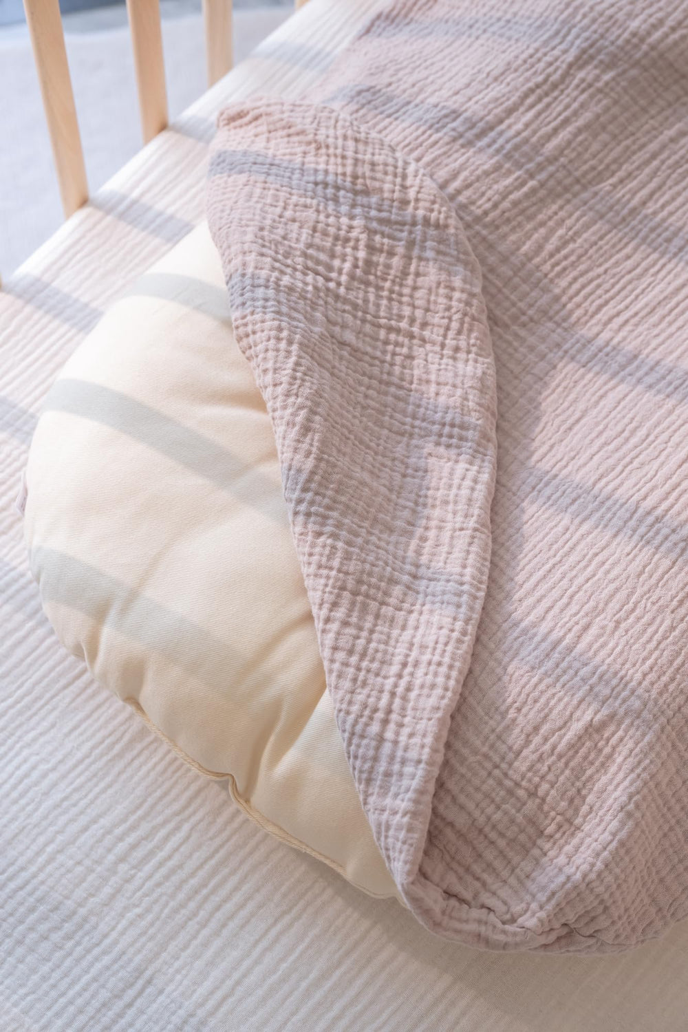 Little Jump organic cotton muslin appears breathable and cozy for infants
