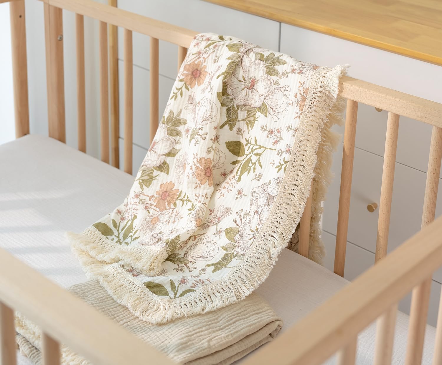Little Jump swaddle featuring bear print used as newborn photo prop.