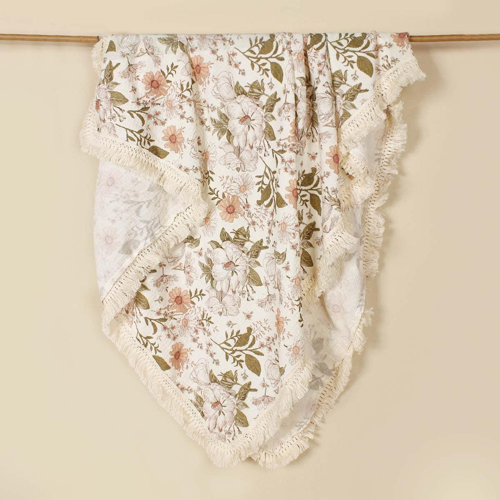 Little Jump crib blanket adds soft texture to nursery decor.