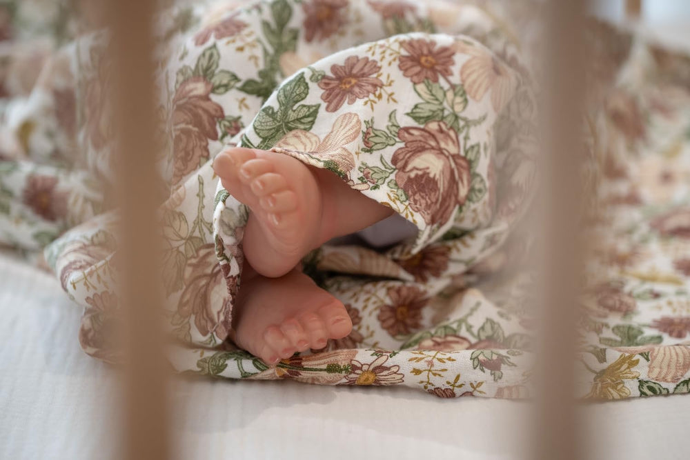 Little Jump two-pack swaddle blankets laid out for versatile baby care.