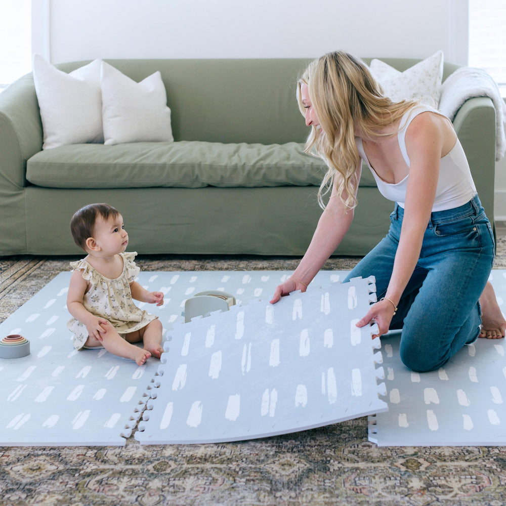 Little Landings mat’s non-slip backing helps keep it in place during play.
