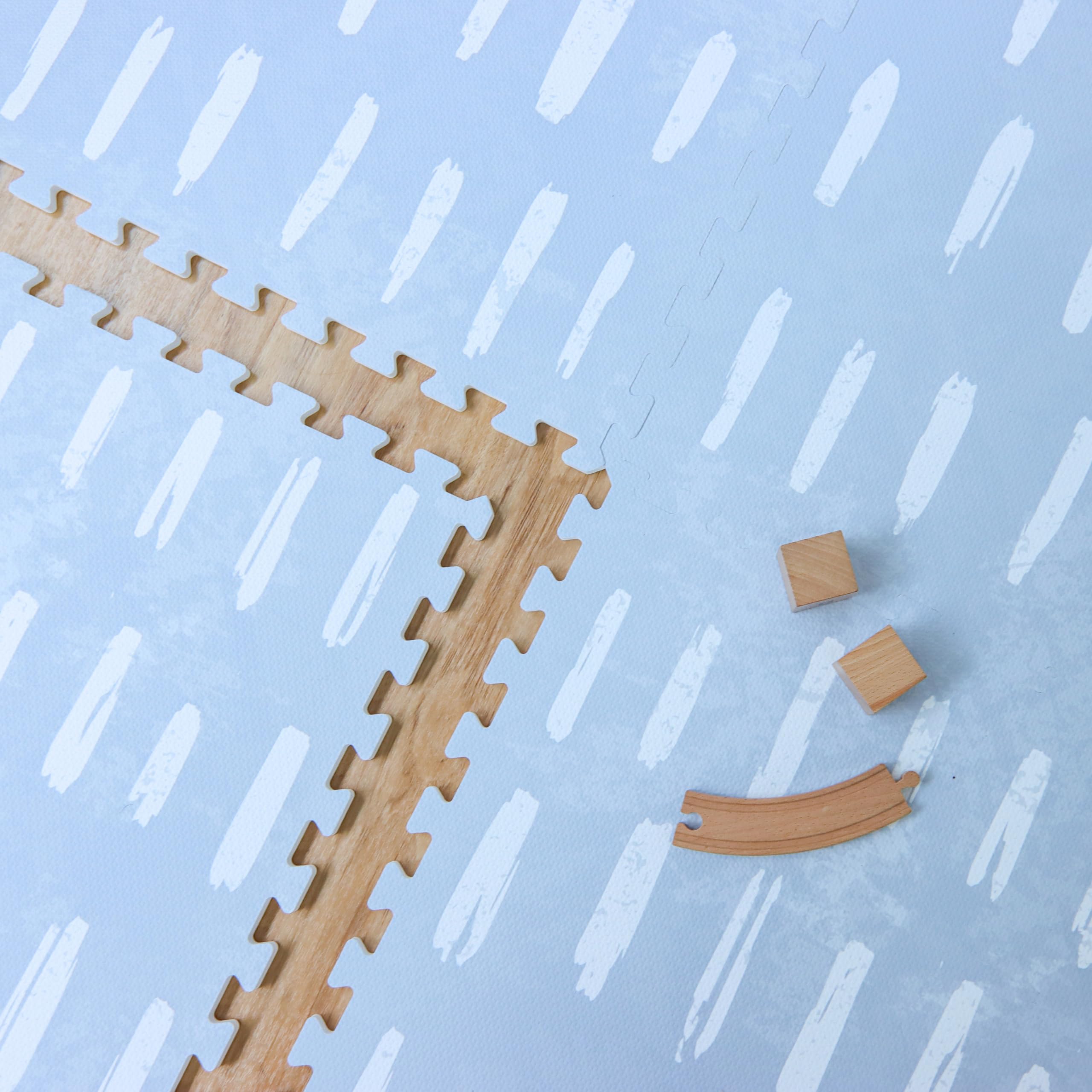 Little Landings Shoreline mat features wipe-clean surface for quick spill cleanup.