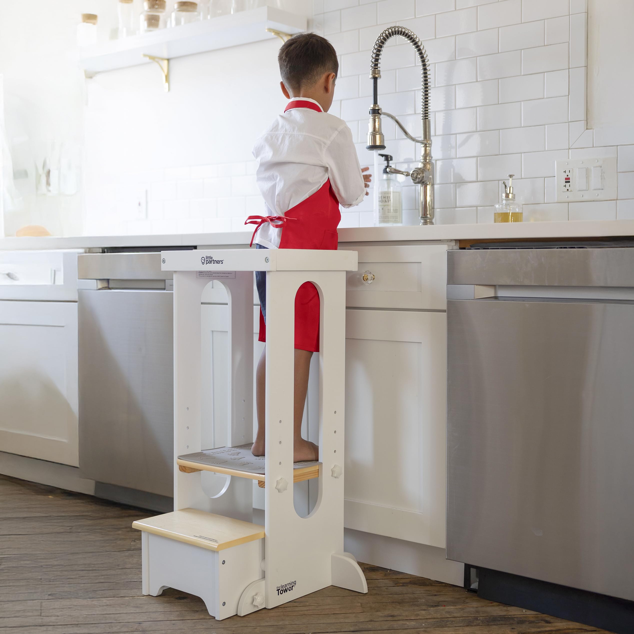 Little Partners learning tower setup highlights adjustable height options for growing kids.