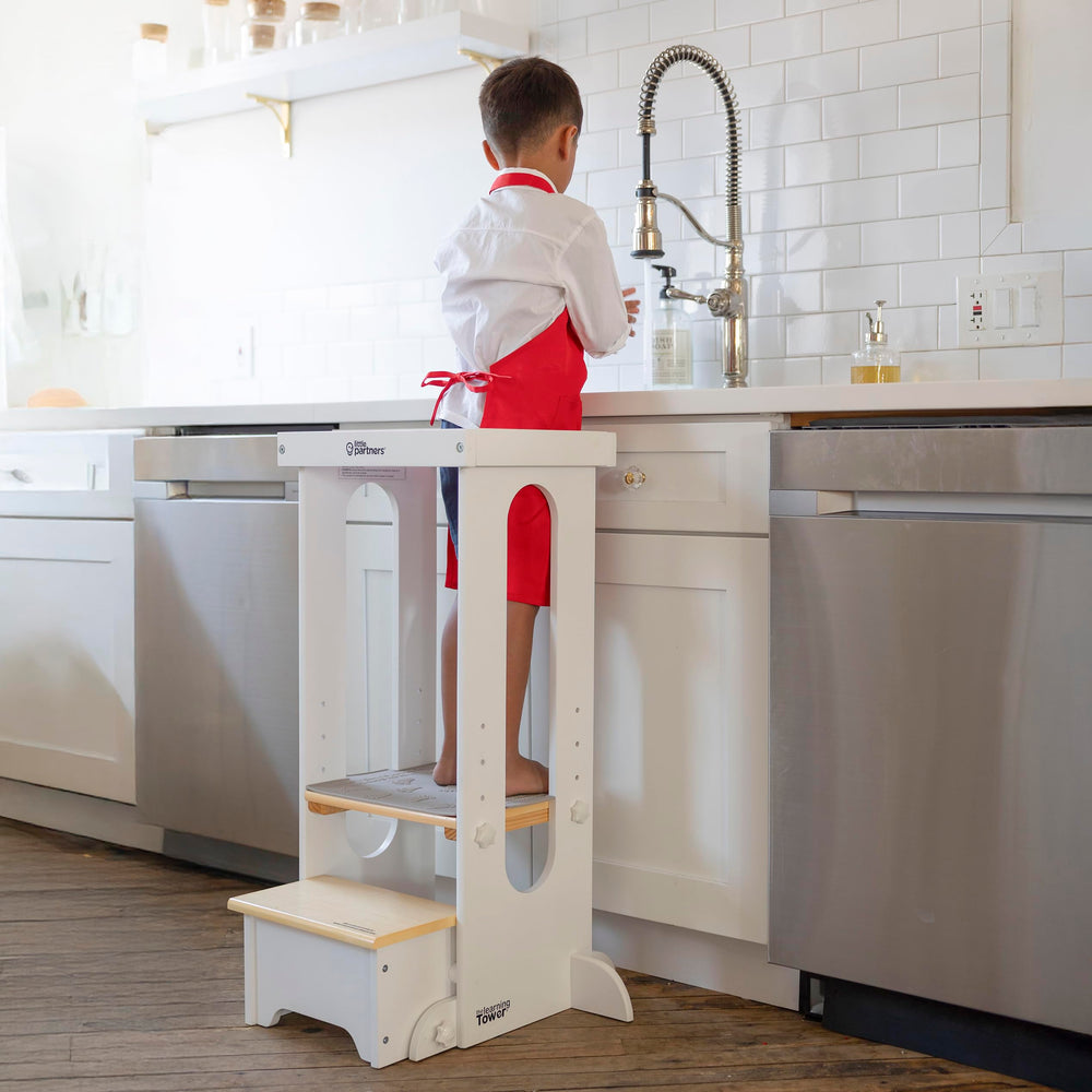 Little Partners learning tower setup highlights adjustable height options for growing kids.