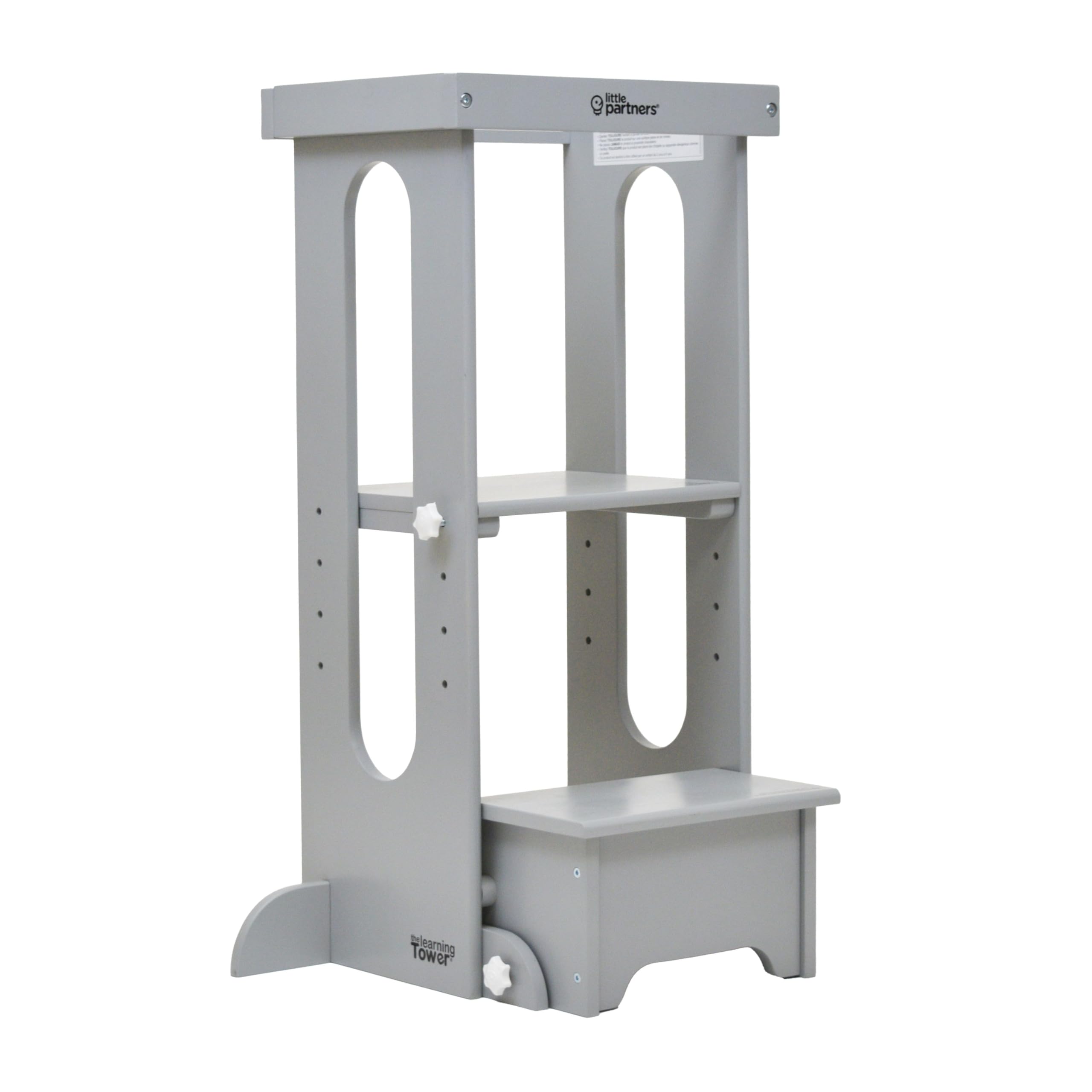 Little Partners Foldable Toddler Tower with wood construction supports safe kitchen exploration.