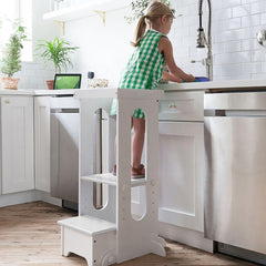 Little Partners learning tower folding step stool enables easy storage after play
