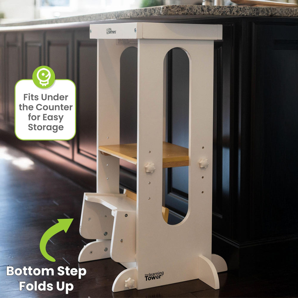 Little Partners height-adjustable tower allows safe, stage-by-stage participation at the counter.