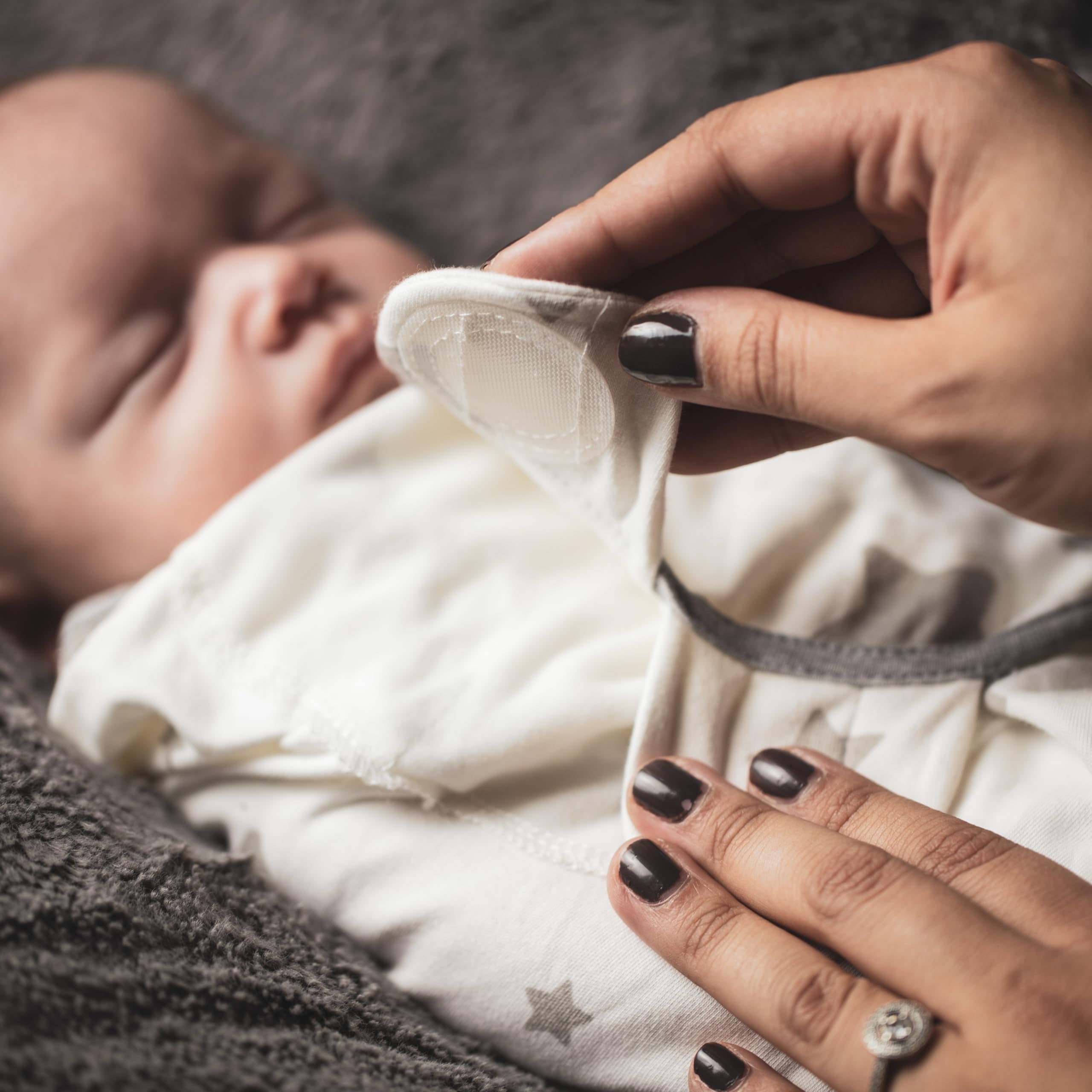 Little Seeds soft breathable cotton swaddle in use highlights comfort and security