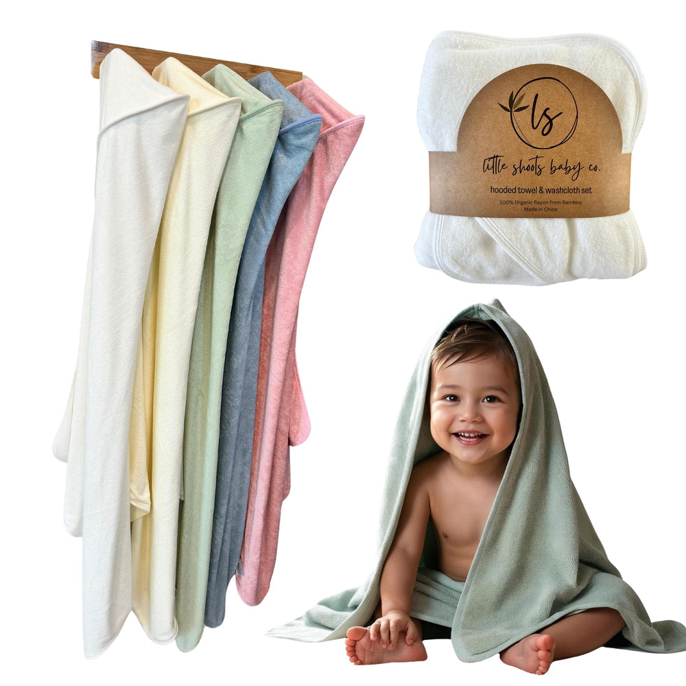 Little Shoots Baby Co bath time routine image highlights cozy towel after splashy moments.