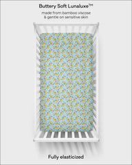 Little Sleepies elastic-band crib sheet demonstrated during dressing, easy to swap between naps