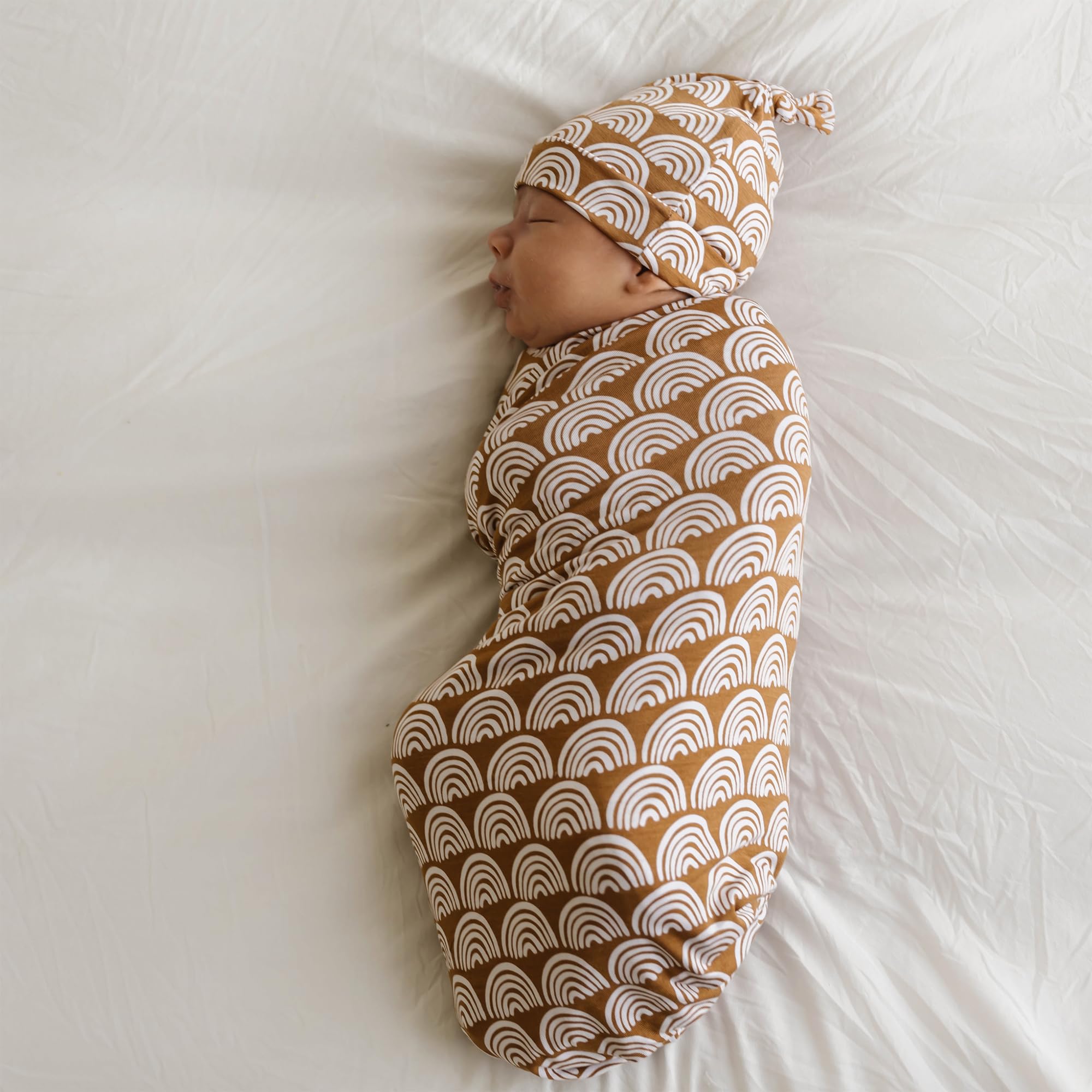 little sleepies hat newborn cozy fit displayed with snug wrap and warmth