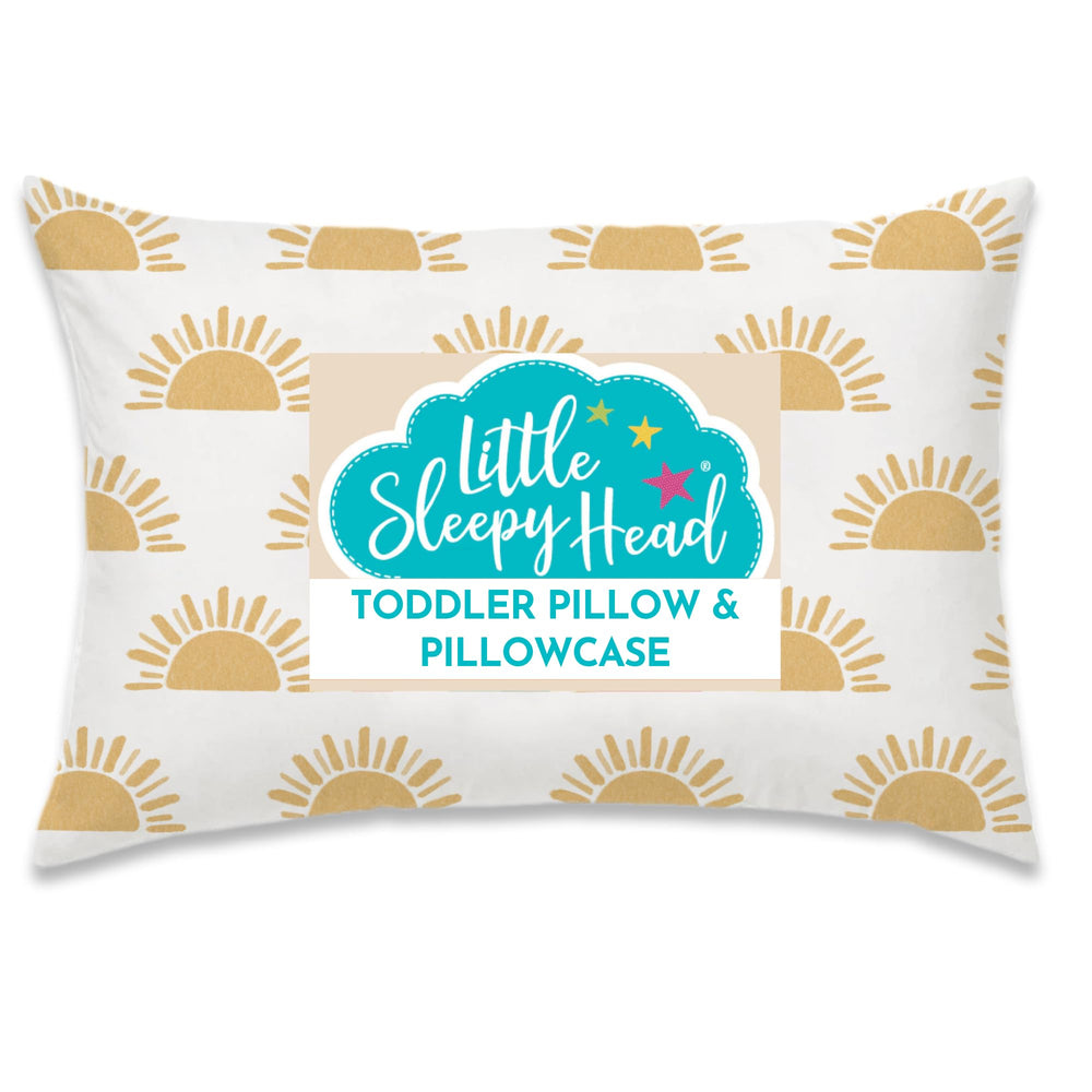 Little Sleepy Head toddler pillow 13x18 demonstrates compact size for cozy naps on a toddler bed.