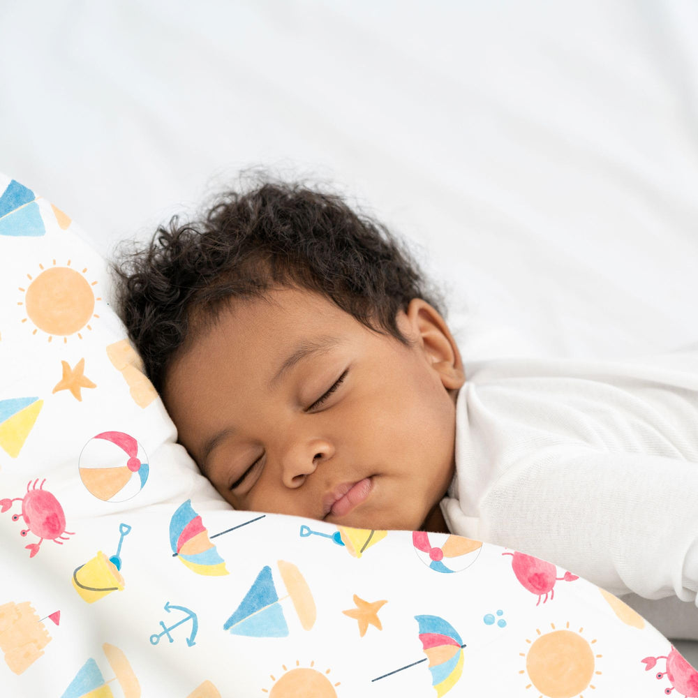 Little Sleepy Head travel-use scene shows toddler pillow ready for on-the-go.