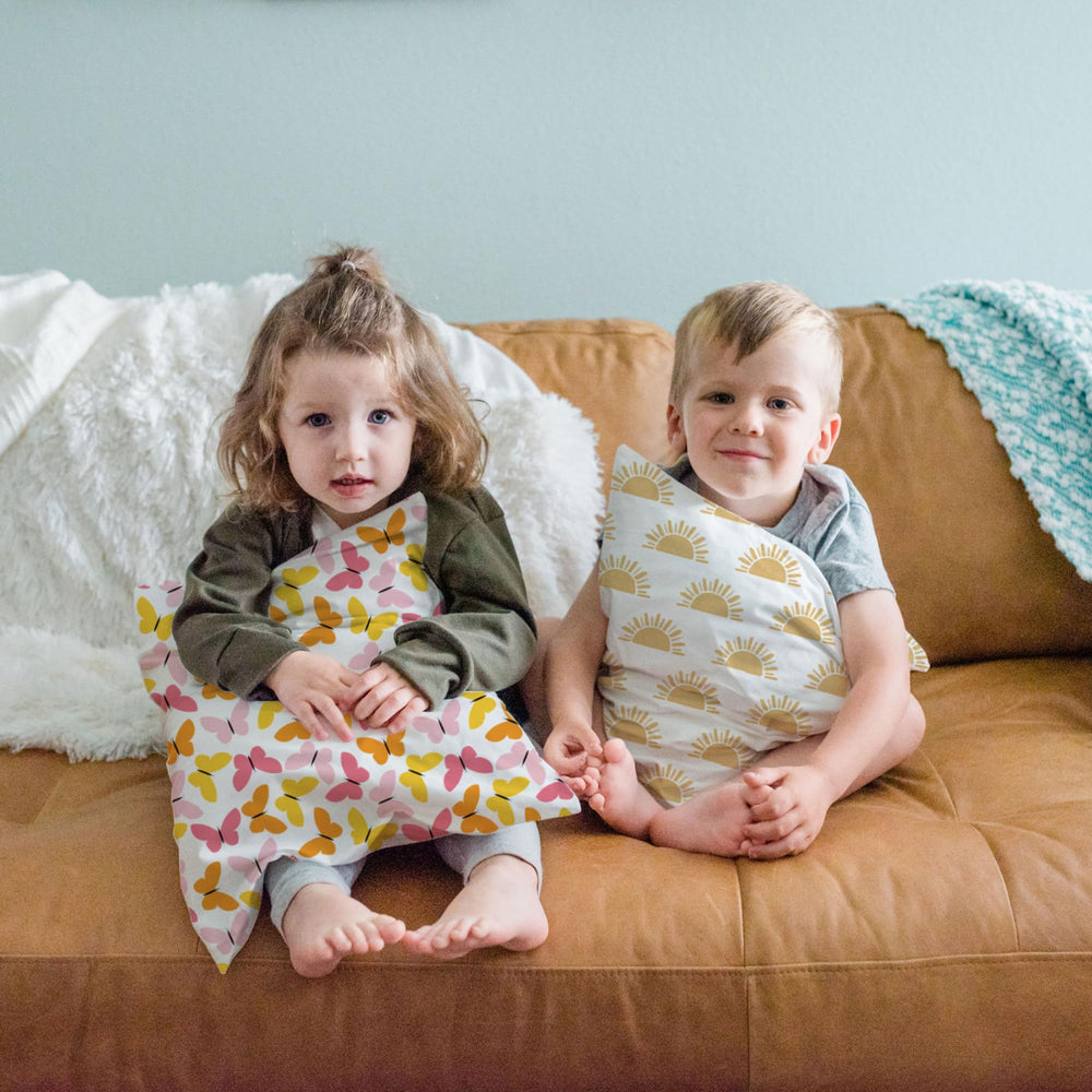 Little Sleepy Head travel-use pillow adds comfort for naps on the go.
