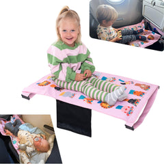 Little Traveler airplane seat extender setup on a tray table for quick comfort