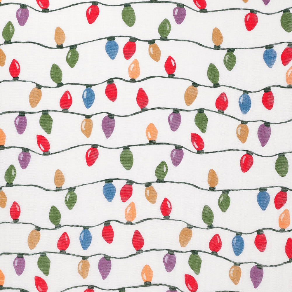 Little Unicorn 30x40 quilt provides versatile play surface and travel comfort.