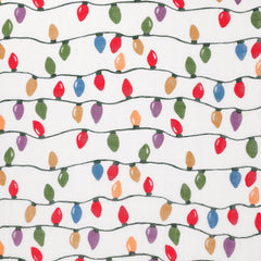 Little Unicorn 30x40 quilt provides versatile play surface and travel comfort.