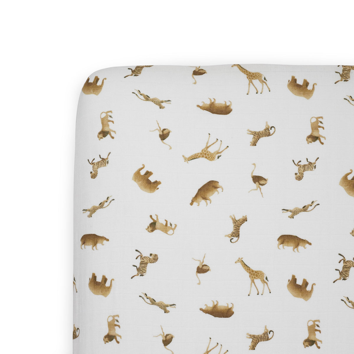 Little Unicorn Animal Crackers crib sheet folded, showcasing soft organic cotton for gentle sleep.