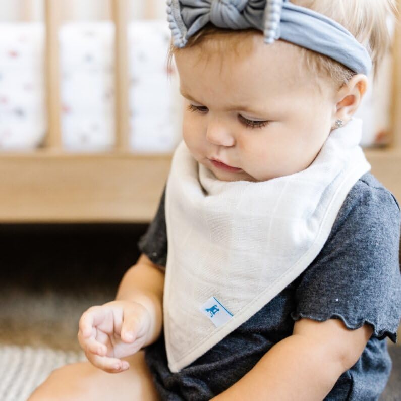 Little Unicorn Wallflower four-pack bibs provide versatile color options for daily use.