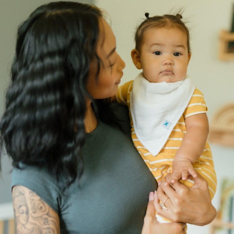 Little Unicorn white bib contoured for gentle, skin-friendly wear.