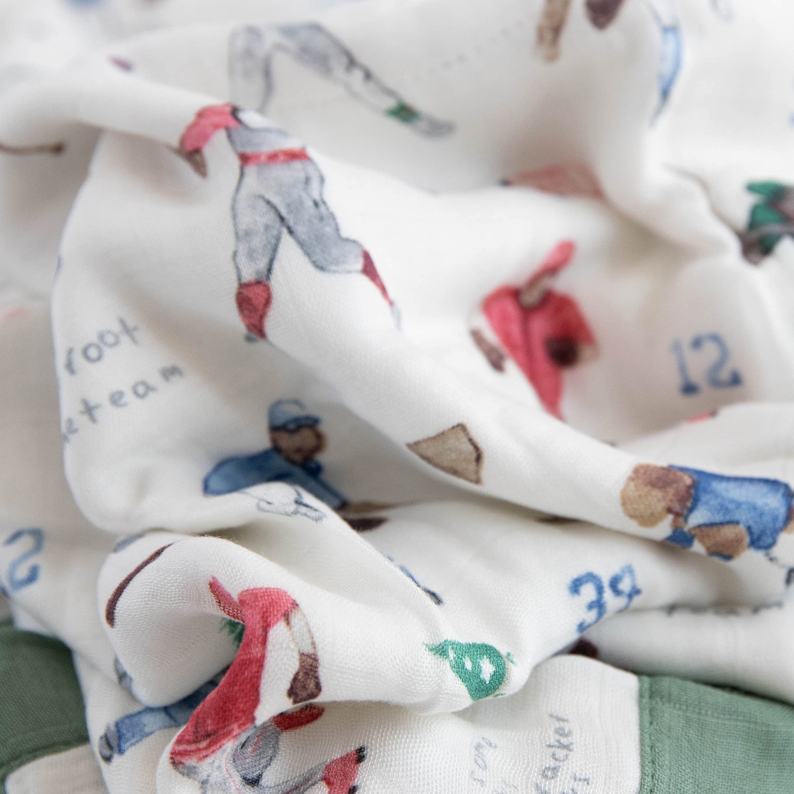 Little Unicorn Deluxe Muslin Quilt stroller on-the-go use with soft warmth.