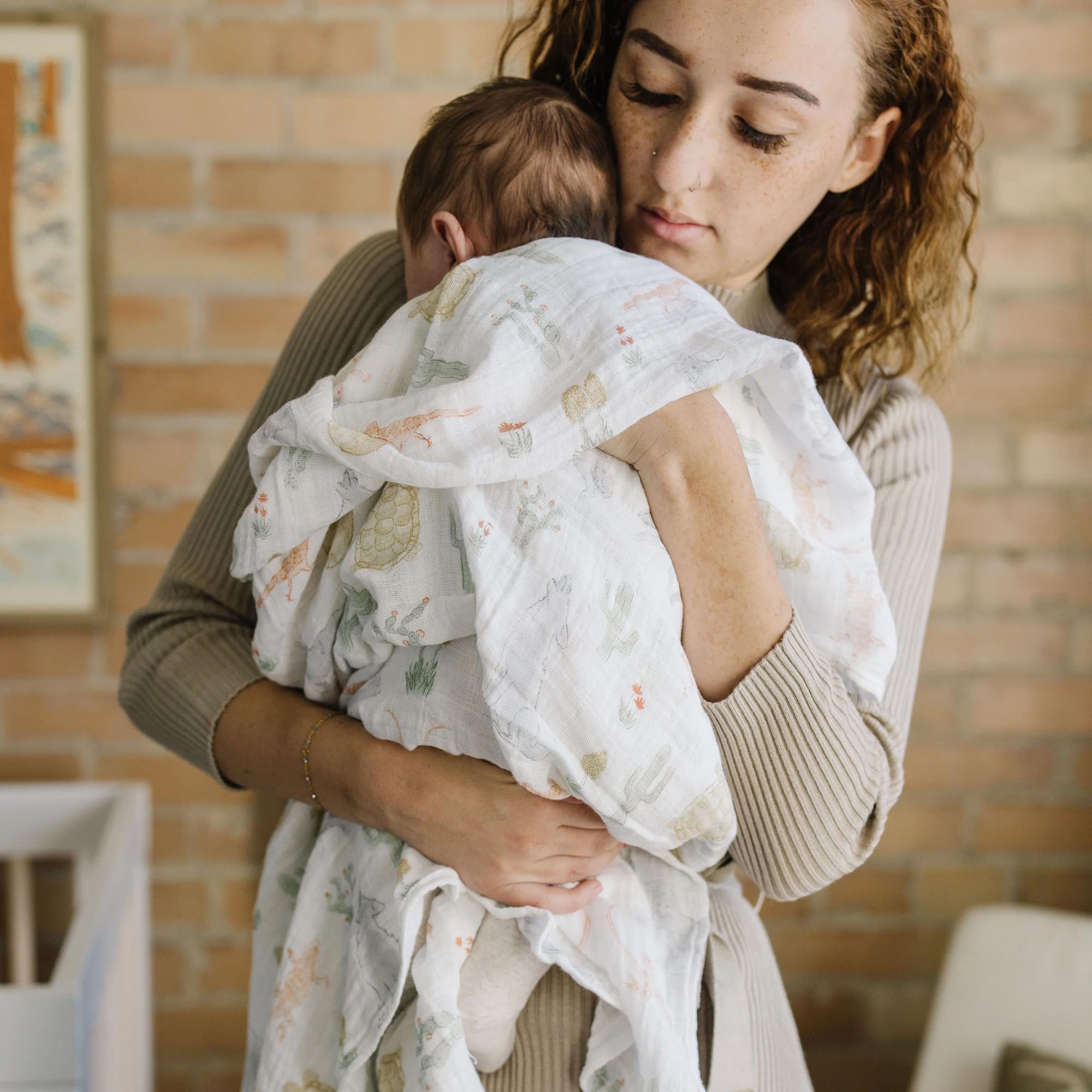 Little Unicorn Desert Night swaddle doubles as a burp cloth on the go.