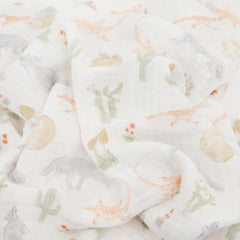 Little Unicorn Desert Night swaddle folded for compact travel and storage.
