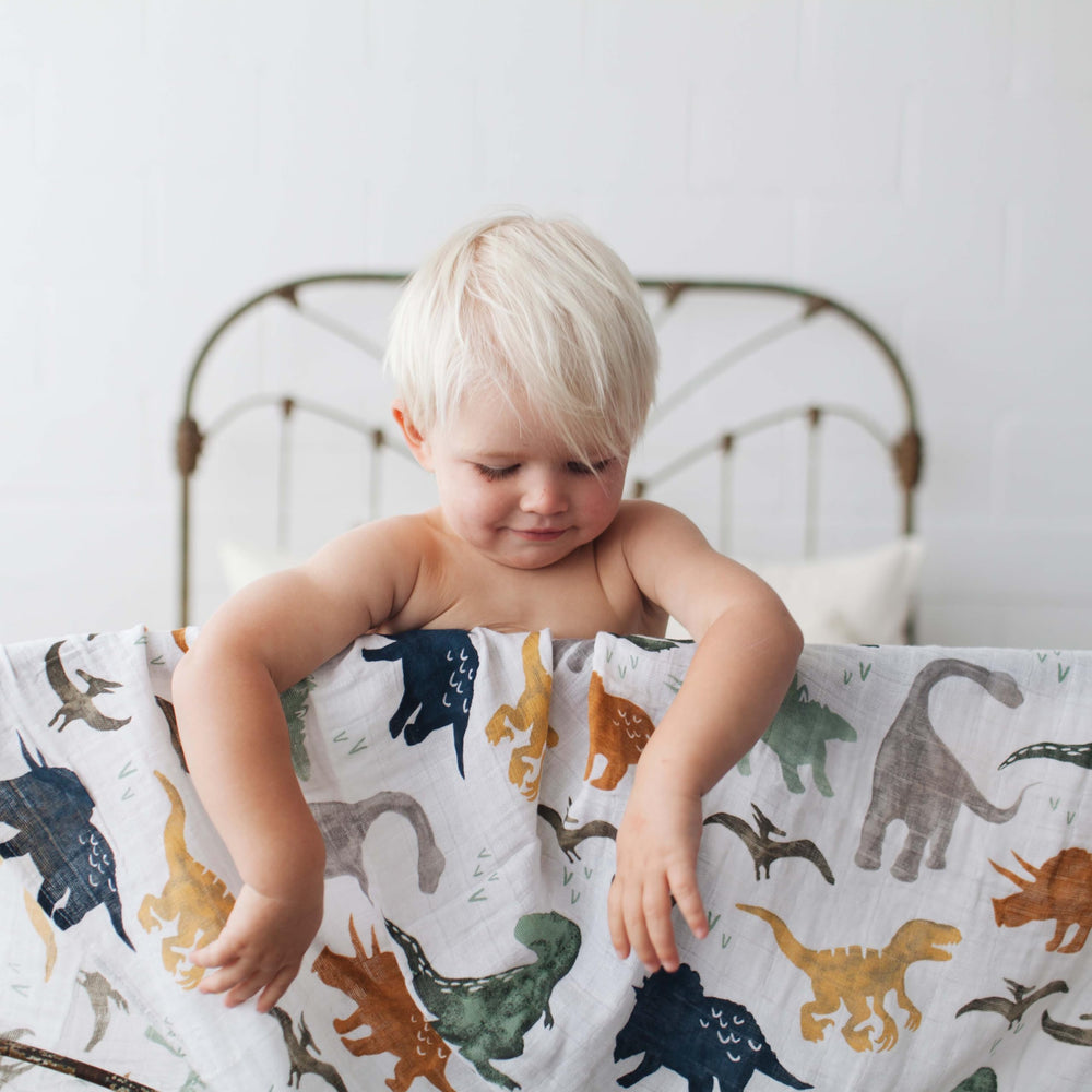 Little Unicorn dino friends blanket spread flat reveals 120x120 cm size and soft muslin