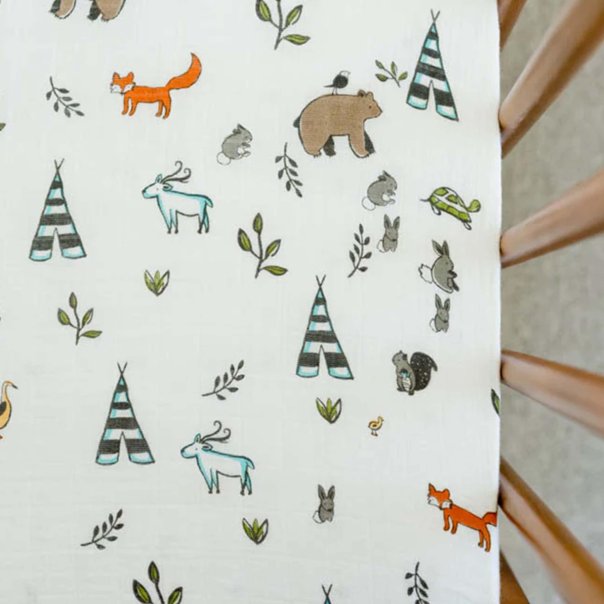 Little Unicorn Forest Friends nursery ambience with this sheet enhancing decor.
