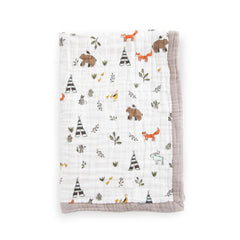 Little Unicorn Forest Friends quilt folded showing ultra-soft four-layer muslin for cozy cuddles.
