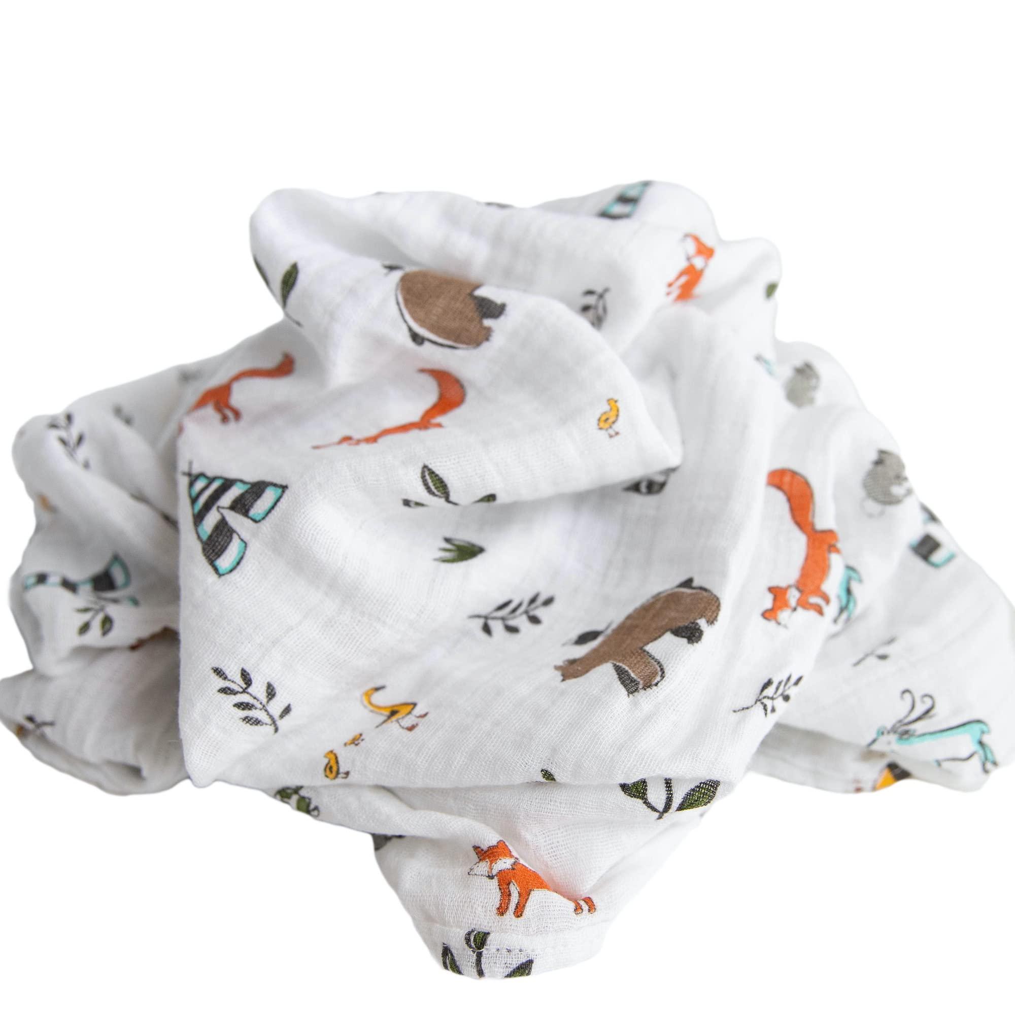 Little Unicorn Forest Friends swaddle on floor during playtime for comfort