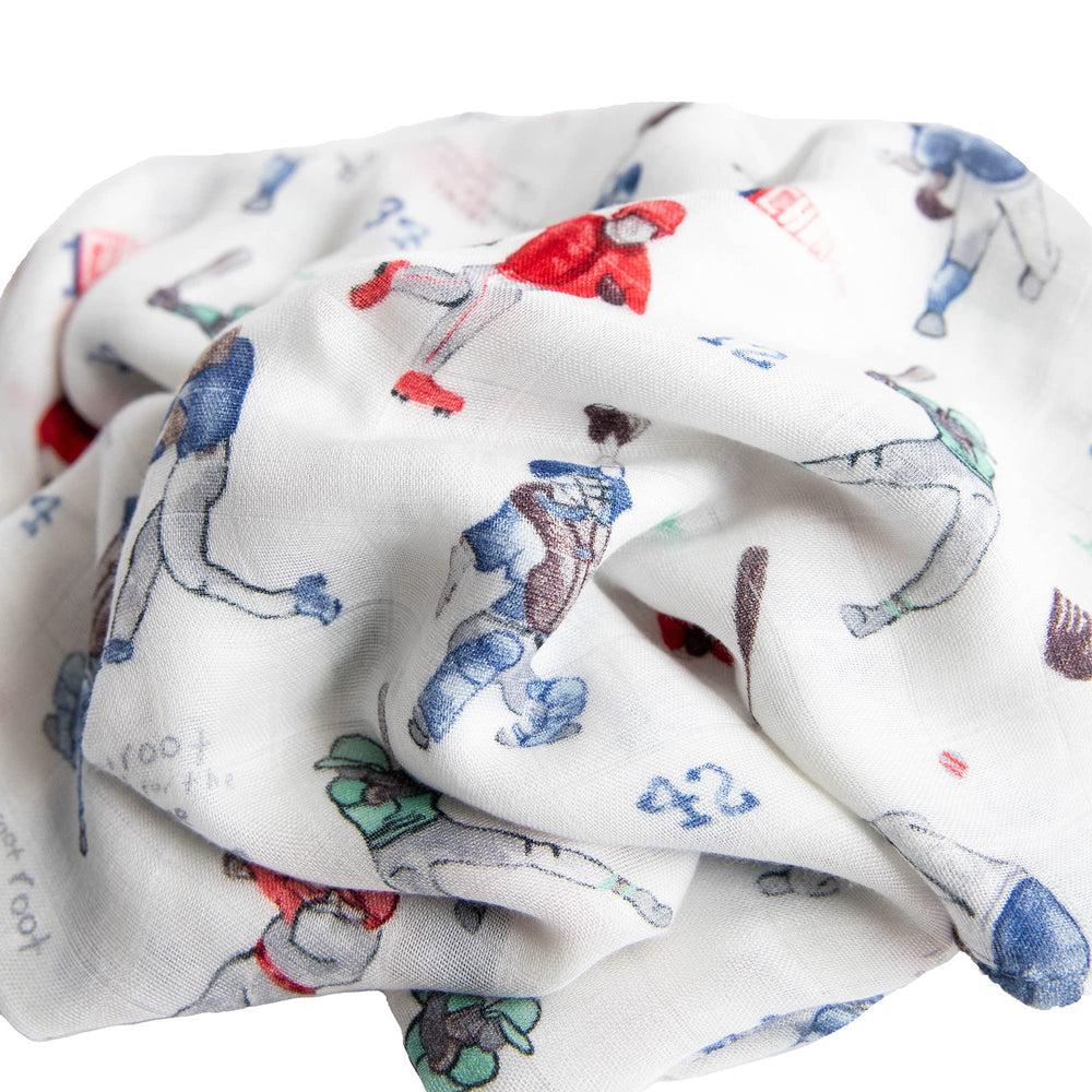 Little Unicorn Homerun Deluxe Swaddle 47x47 in-use image demonstrates secure and roomy wrap