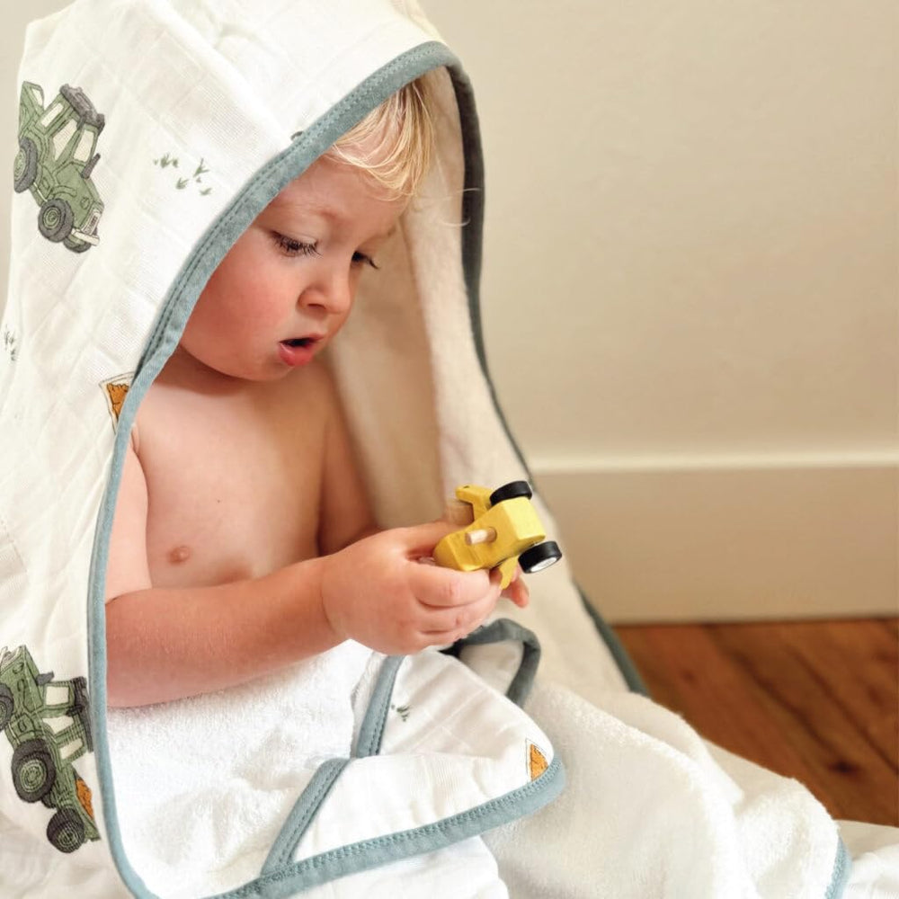 Little Unicorn hooded bath towel close-up highlights plush terry blend for gentle drying.