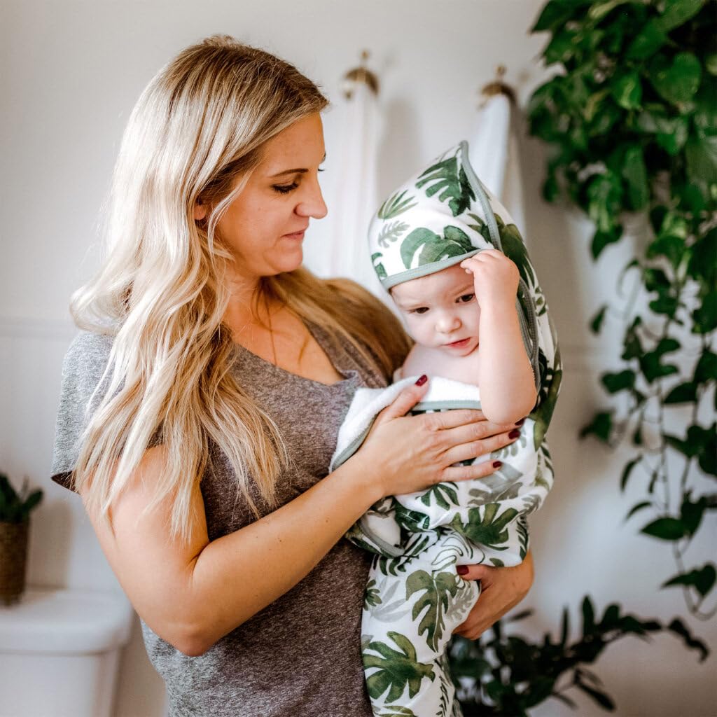 Little Unicorn hooded towel tropical leaf size 30x30 suitable for newborns.