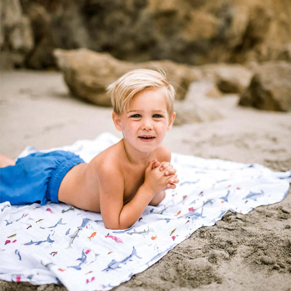 Durable stitching on Little Unicorn baby blanket withstands daily use.