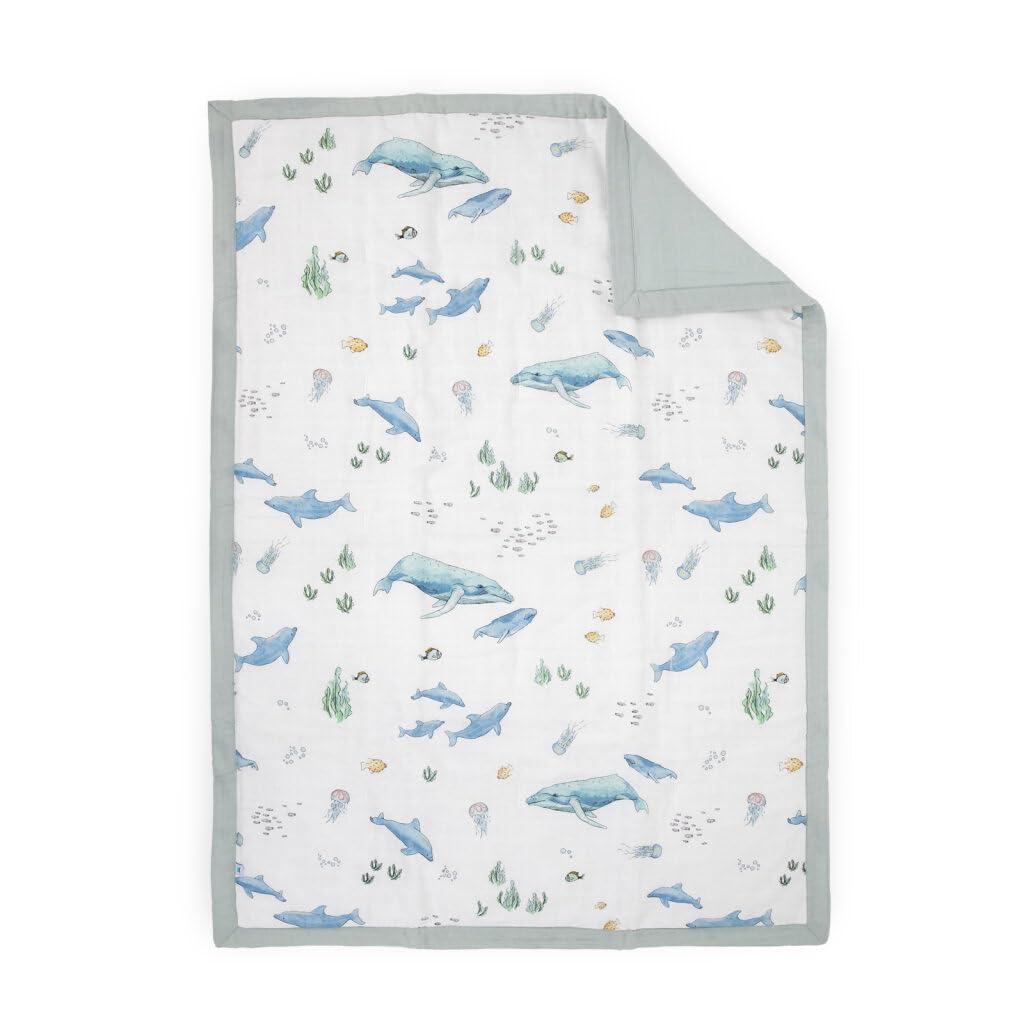 Little Unicorn Lofty Comforter whales close-up shows soft, breathable warmth for bedtime.