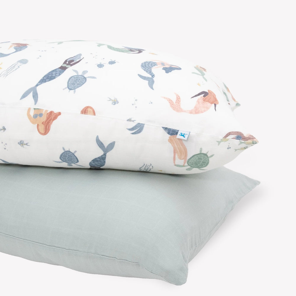 Little Unicorn Mermaid Party pillowcase close-up shows ultra-soft muslin for cozy nights